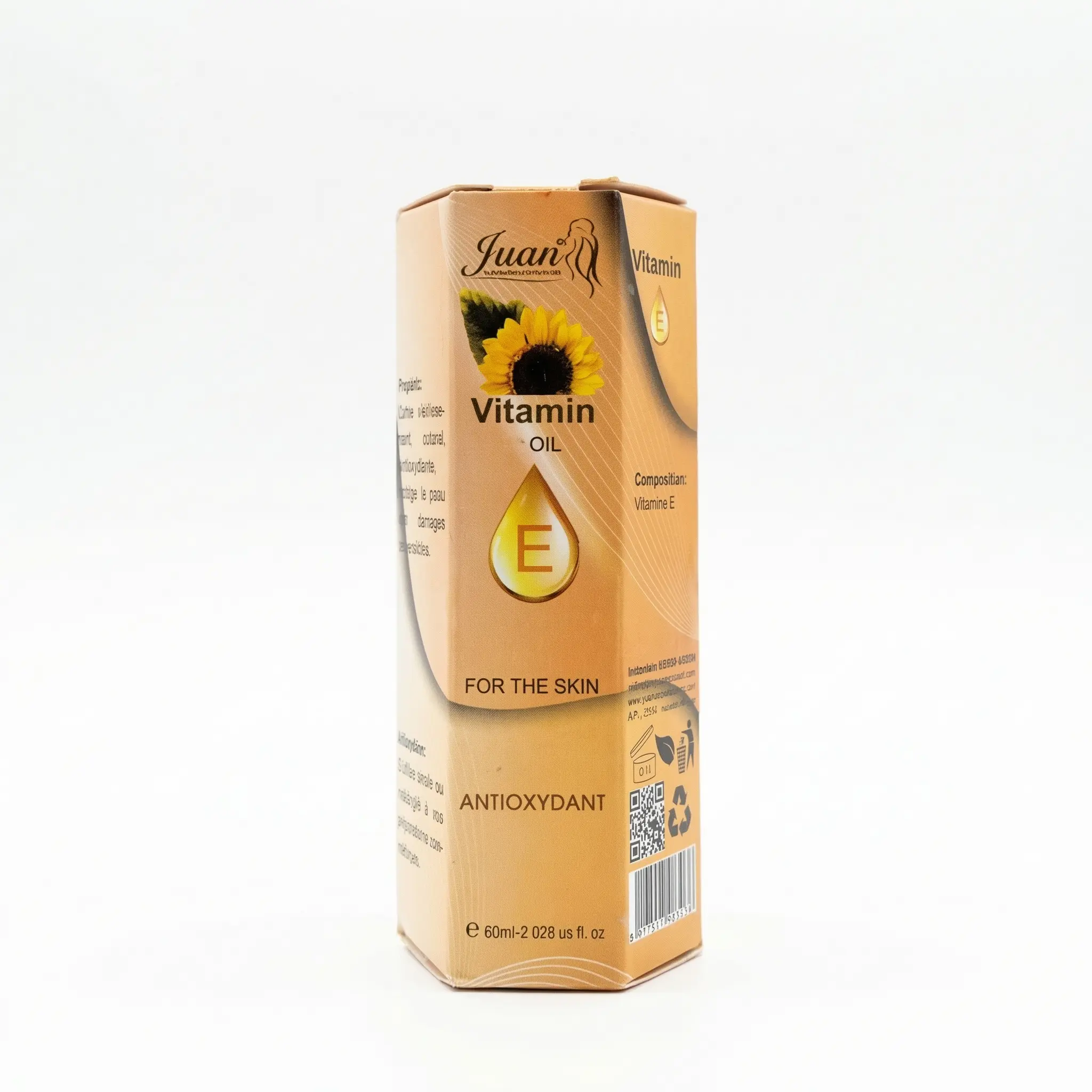 Flacon de vitamine E Juan 60ml posé devant fond neutre.